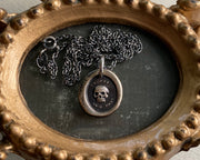 bronze skull necklace