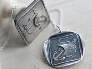 NIL DESPERANDUX wax seal necklace