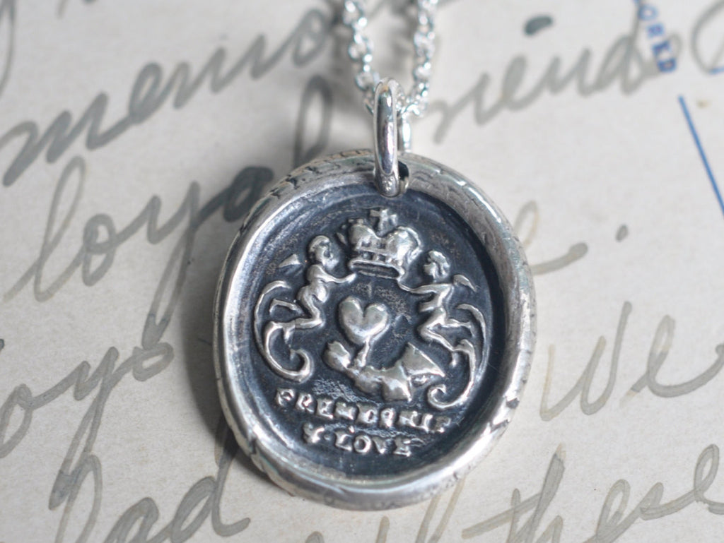 heart in hand wax seal necklace