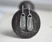 skeleton and widow earrings