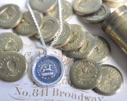 wounded stag wax seal pendant