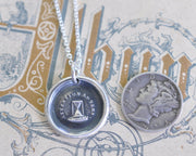 hourglass pendant