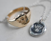 winged hourglass wax seal jewelry