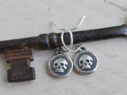 skull dangle earrings