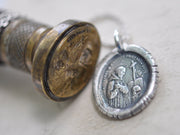 saint francis wax seal jewelry