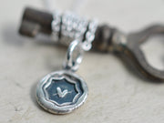pierced heart wax seal necklace