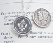 fleur de lis pendant