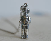 frozen Charlotte doll pendant