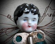 antique frozen charlotte doll head