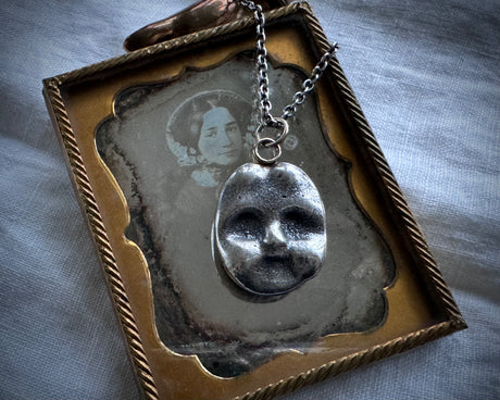 doll face necklace