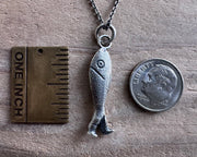 fish with legs necklace pendant - historic fish out of water jewelry