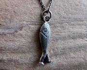 fish with legs necklace pendant - historic fish out of water jewelry