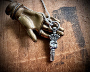 Victorian hand watch key charm