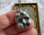 doll face necklace pendant
