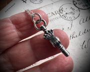 Victorian hand watch key charm