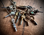 Victorian hand watch key charm