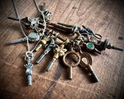 Victorian hand watch key charm