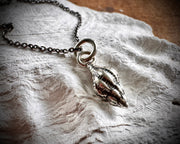 whelk shell spiral necklace pendant in sterling silver