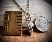whelk shell spiral necklace pendant in sterling silver