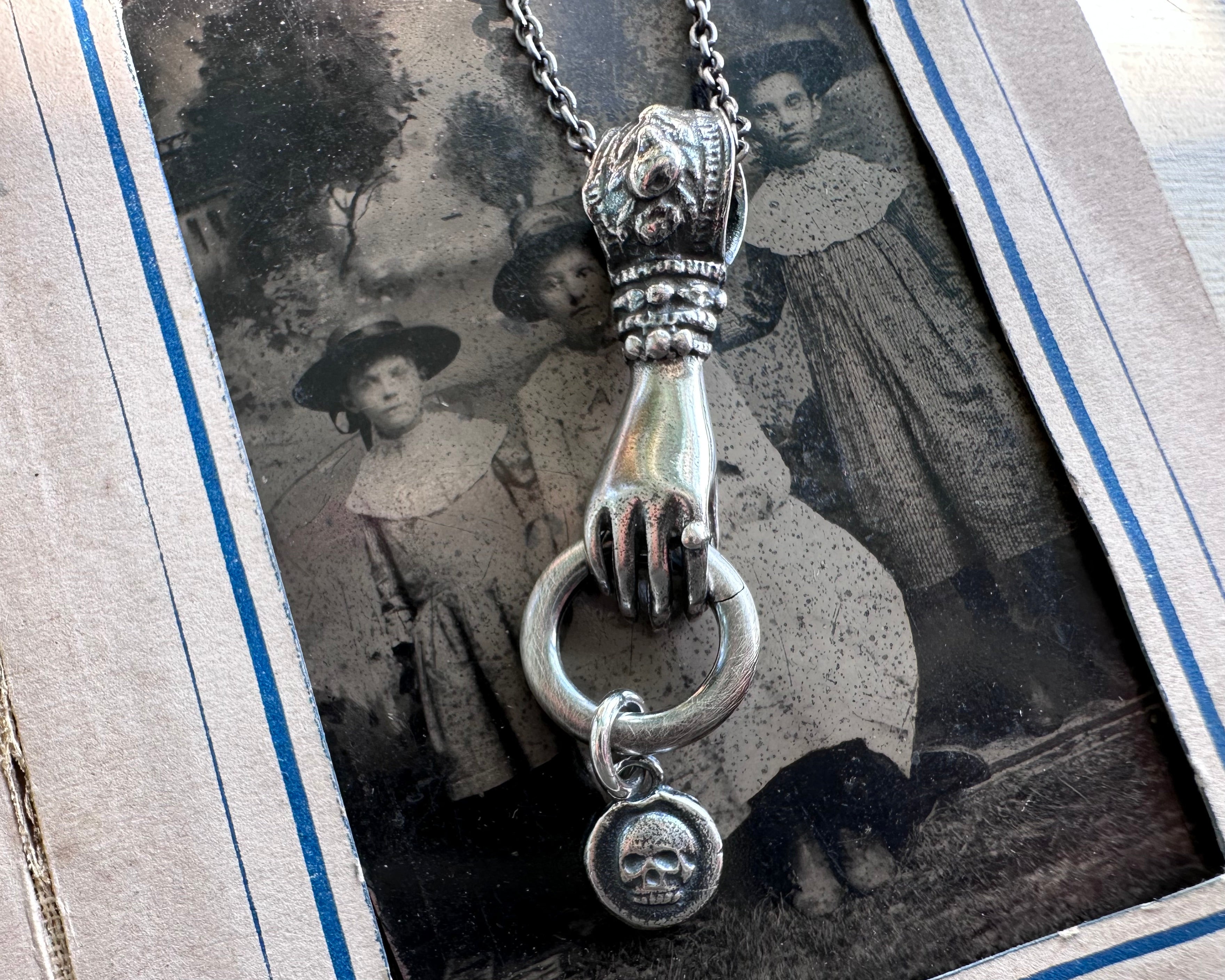 Victorian hand holding charm holder necklace pendant - figural right h