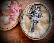 Frozen Charlotte doll necklace pendant - holding a heart - doll jewelry