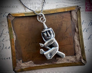 witch on her broom pendant - Halloween jewelry