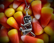 witch on her broom pendant - Halloween jewelry