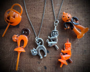 witch on her broom pendant - Halloween jewelry