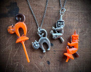 witch on her broom pendant - Halloween jewelry