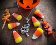 witch on her broom pendant - Halloween jewelry