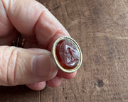 a winged cherub delivering a heart fob seal - L'AMITIE - antique wax seal