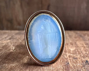 woman leaning on an anchor wax seal fob - antique wax seal