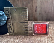 a little bird resting on an anchor leaning against a rock - antique fob wax seal