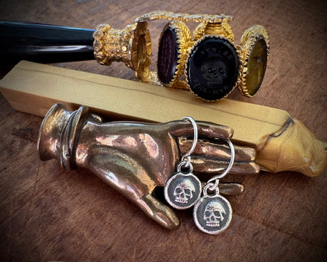 silver skull earrings