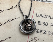 skull ouroboros necklace