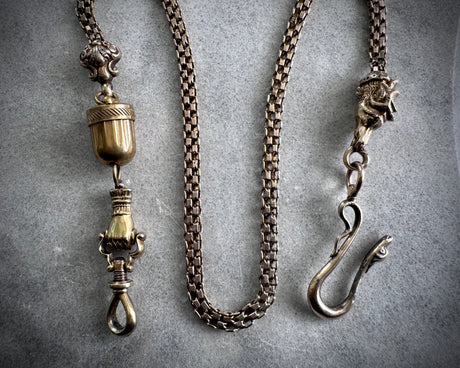 antique pocket watch chain with an anti theft spiked acorn - antique jewelry
