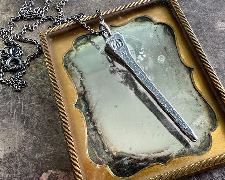 coffin nail necklace pendant