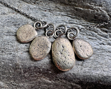 beach pebble necklace pendant in mixed metals - sterling silver and bronze
