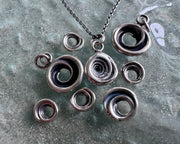 puka shell earrings - tiny sterling spiral puka shells