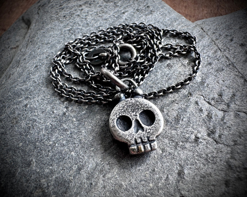 skull necklace pendant - with a tiny gold tooth - memento mori jewelry