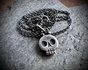 skull necklace pendant - with a tiny gold tooth - memento mori jewelry