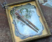 bronze coffin nail necklace