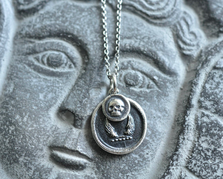 skull and wings wax seal necklace