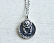 winged skull wax seal necklace