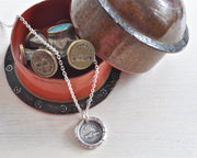 clasped hands wax seal necklace
