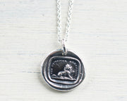 lion and mouse pendant