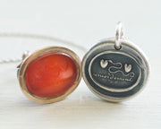two hearts and serpent wax seal necklace