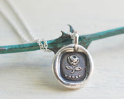under the rose wax seal necklace