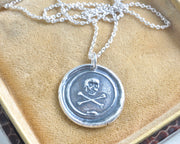 skull and crossbones wax seal pendant