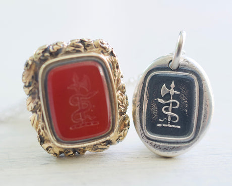 snake and axe wax seal necklace